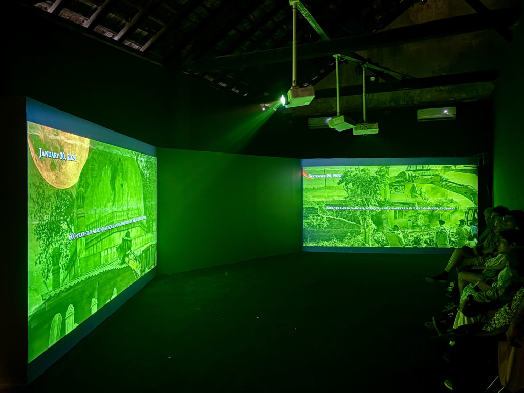 A three-channel cinematic installation by Pallavi Paul, exploring contagion at the 6th Kochi-Muziris Biennale. The image is from February 2026.